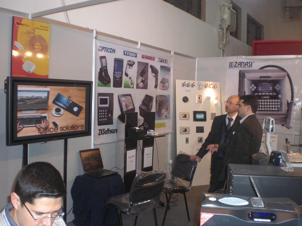 Endless Data exhibition booth displaying POS systems, access control panels, biometric devices, and office automation technologies