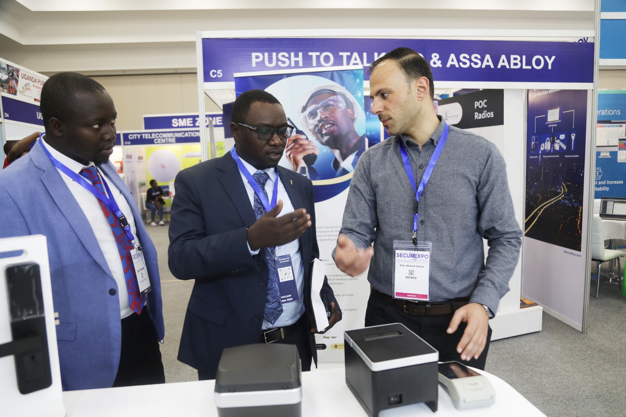 ZKTeco expert demonstrating access control hardware to delegates at SecureExpo East Africa 2023 in Nairobi